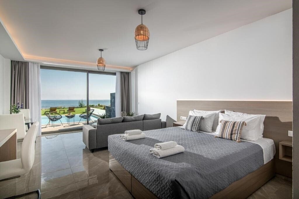 Фото Ebenus Suites Adults Only by Checkin 4*