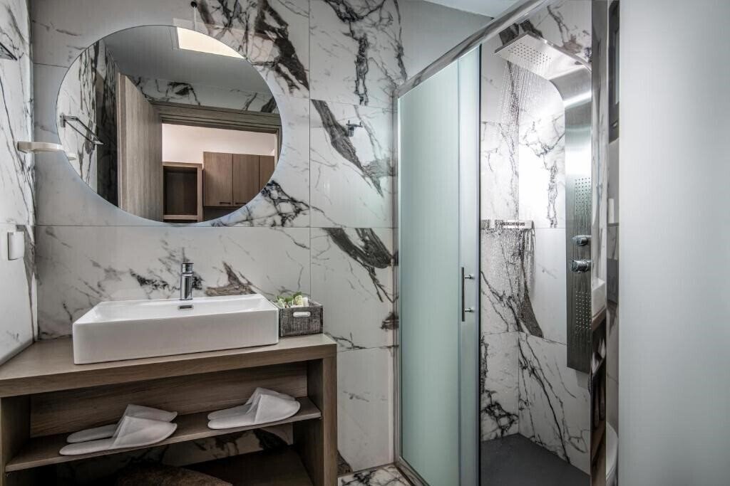 Фотография Ebenus Suites Adults Only by Checkin 4*