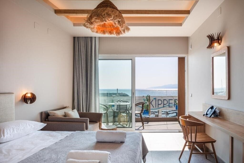 Изображение Skipper Beachfront Suites 4*