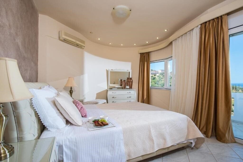 Фото Wine Dark Sea Villa Artemis 4*