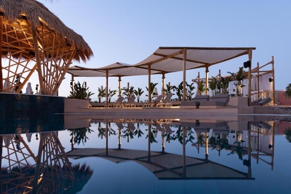 Фотографія Asterias Village Apartments 4*