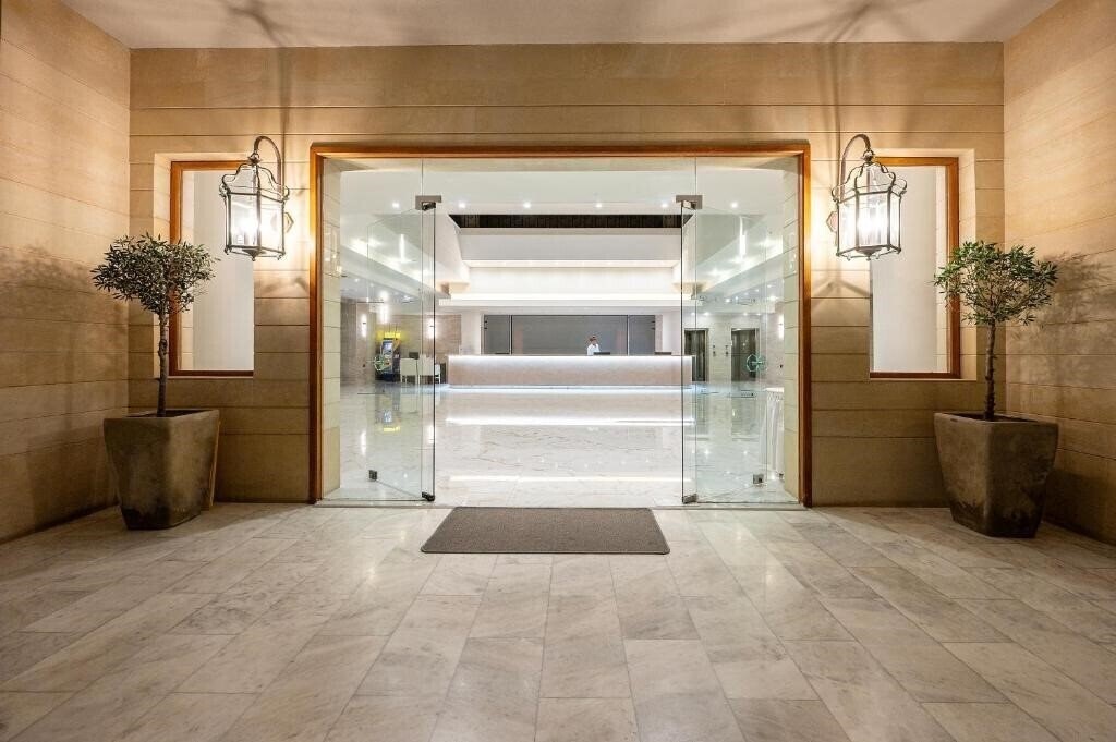 Фото Athina Palace Resort & SPA 5*