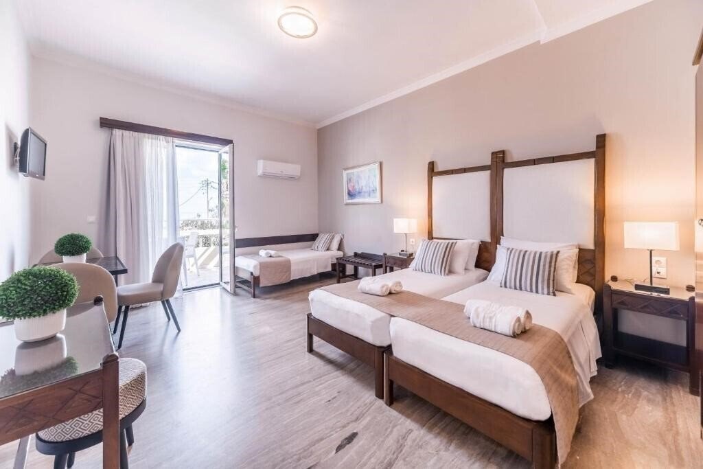 Отель Kalamaki Mare Suites 4*