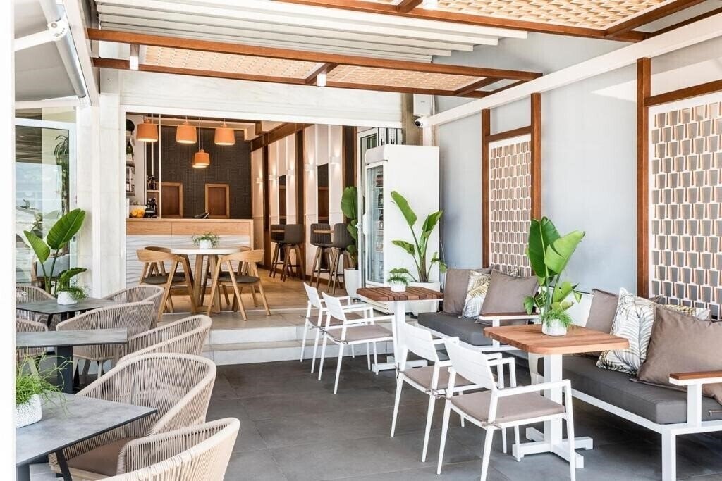 Фото Kalamaki Mare Suites 4*