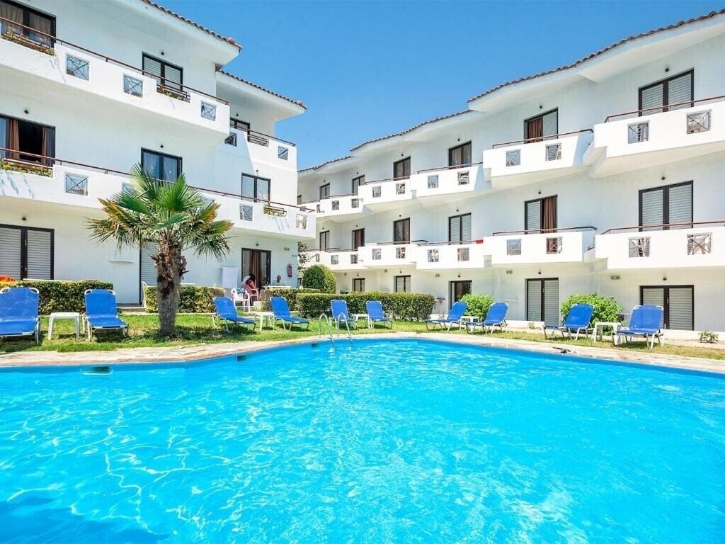 Фото Xenios Dolphin Beach 3*