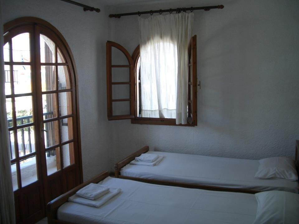 Готель Tzogalis Apartments апартаменты