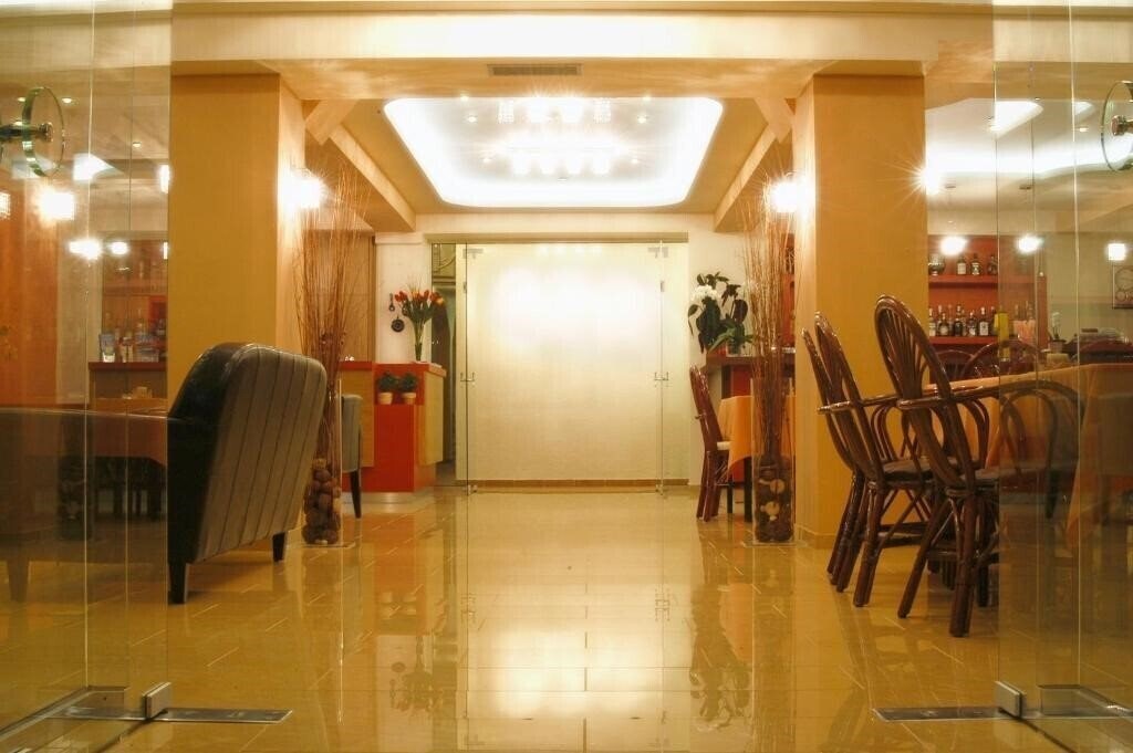 Фото Xenios Loutra Beach Hotel 3*