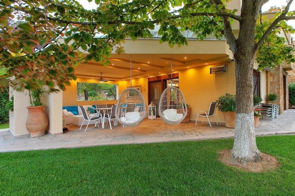 Фото Sani Luxury Villas Collection - Anemone Villa 5*