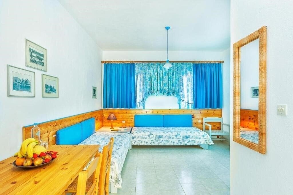 Фото Xenios Faros Apartments 2*