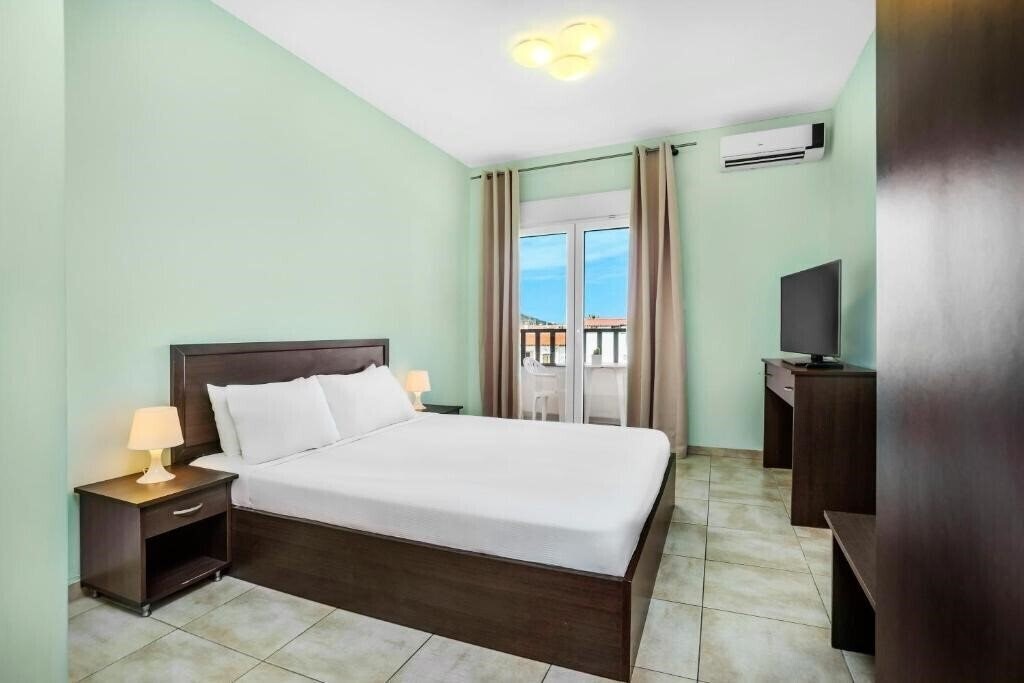 Фотографія Poseidon Hotel Pefkohori 2*