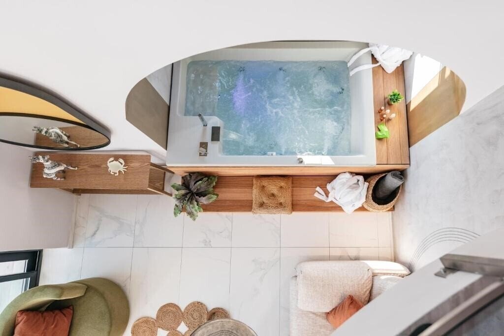 Фото Cocooning Suites By Blue Carpet 5*