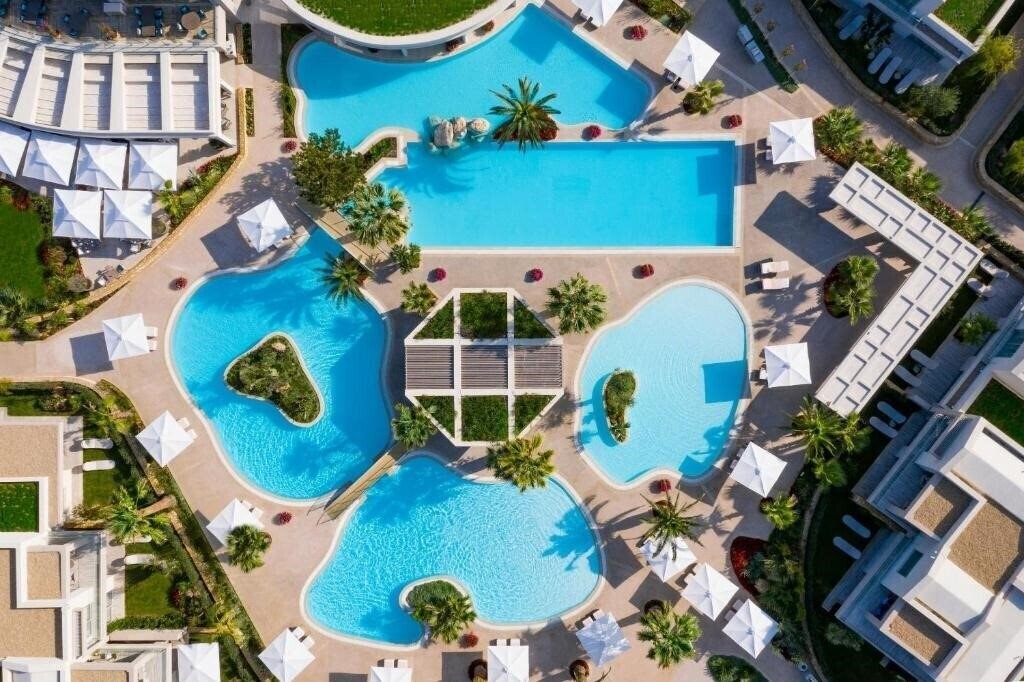 Отель Porto Sani Village 5*