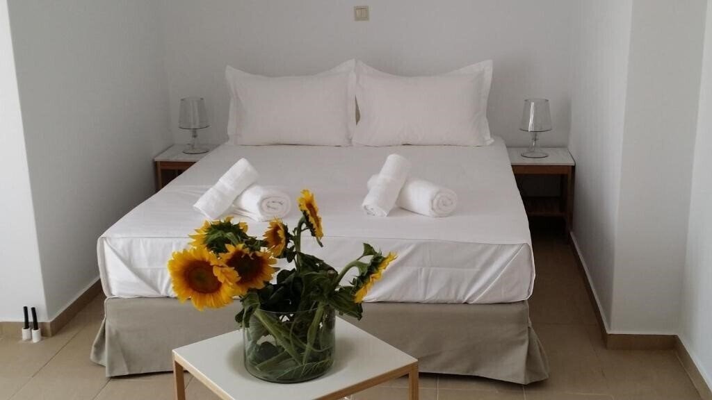 Фото Niovi Boutique Apartments 4*