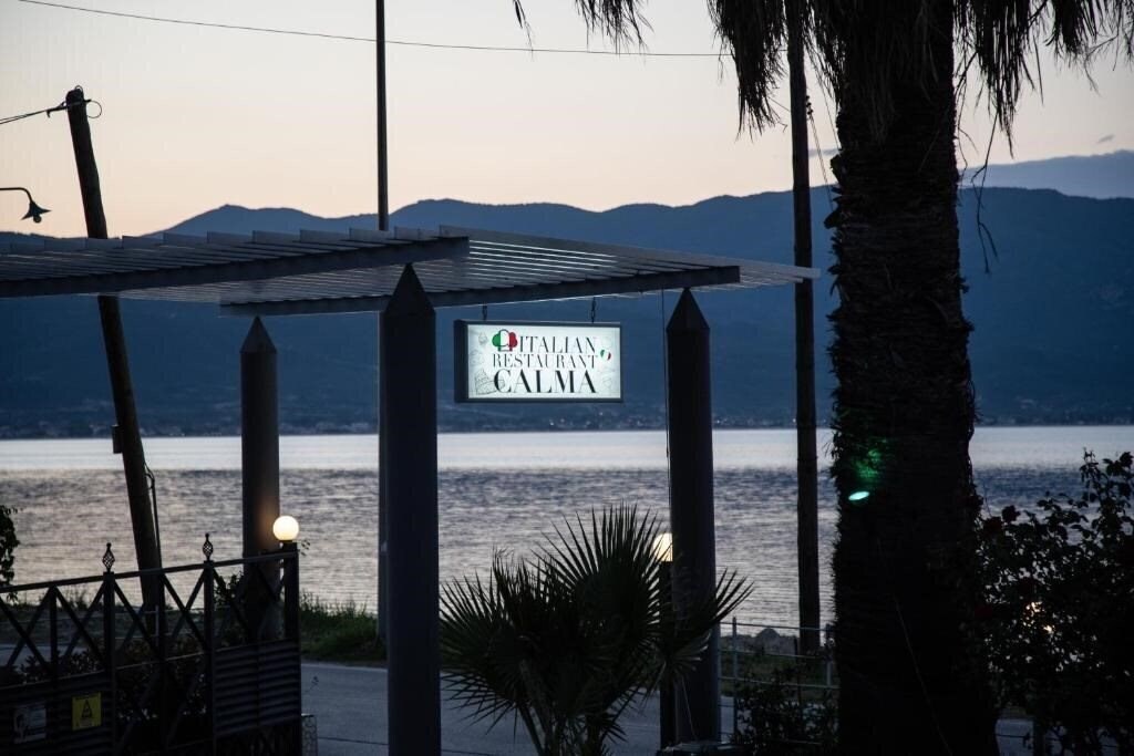 Отель Calma Beach Hotel 3*