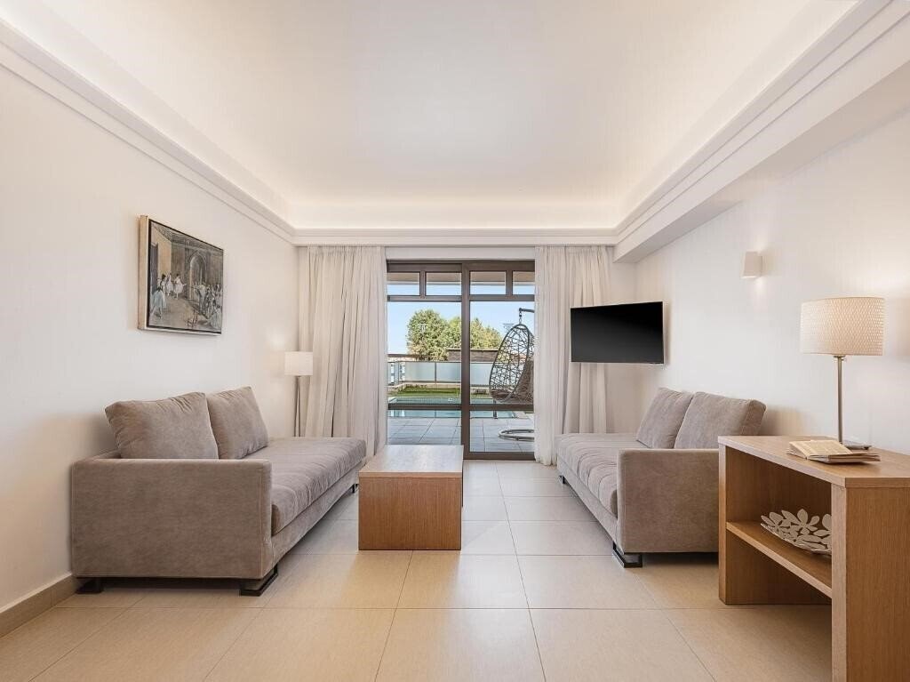 Фотография Porto Platanias Beach Resort & SPA 5*