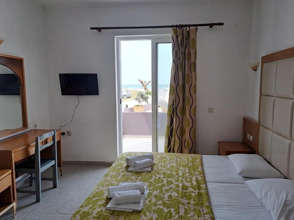 Фото Haridimos Apartments 3*