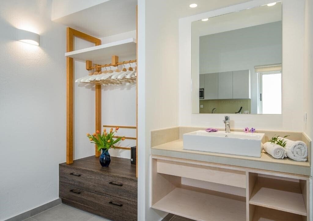 Фотографія Lotus Hotel Apartments 4*