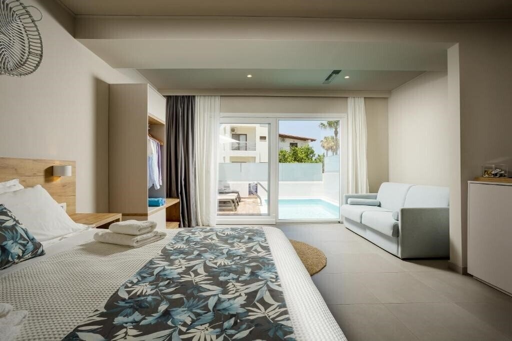 Фото Sarpidon Suites 4*