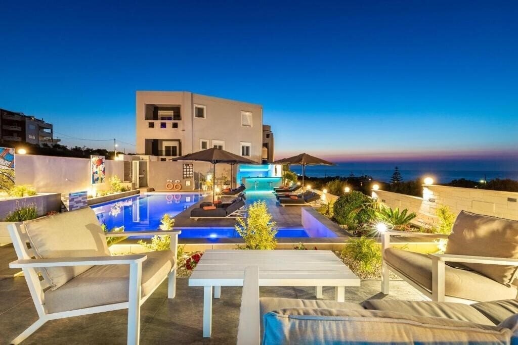 Отель Talos Luxury Suites 4*