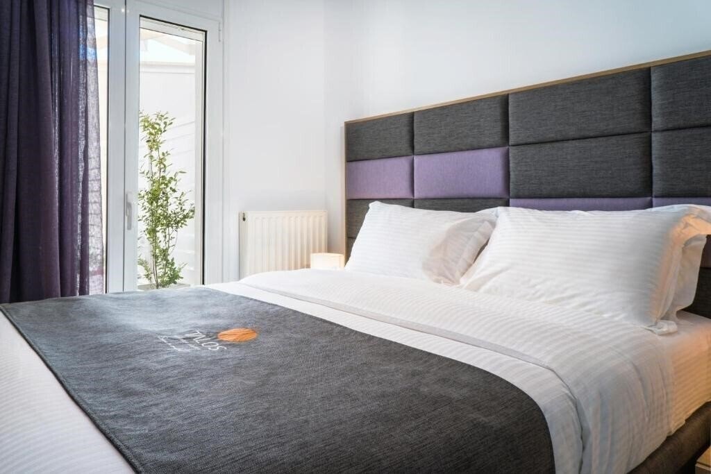 Фото Talos Luxury Suites 4*