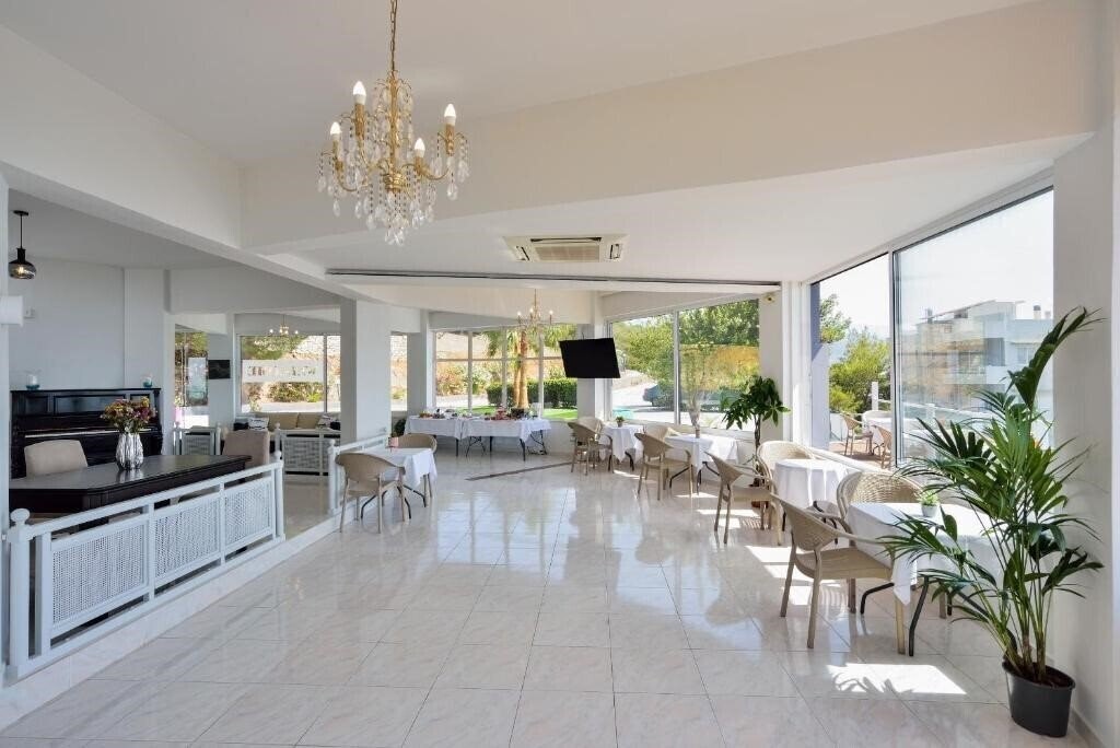 Фото Loucerna Suites Chania 4*