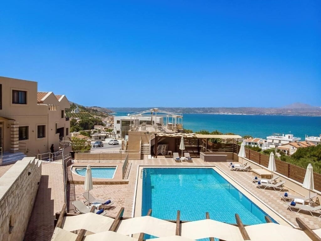 Отель Sunrise Suites & Apartments 4*