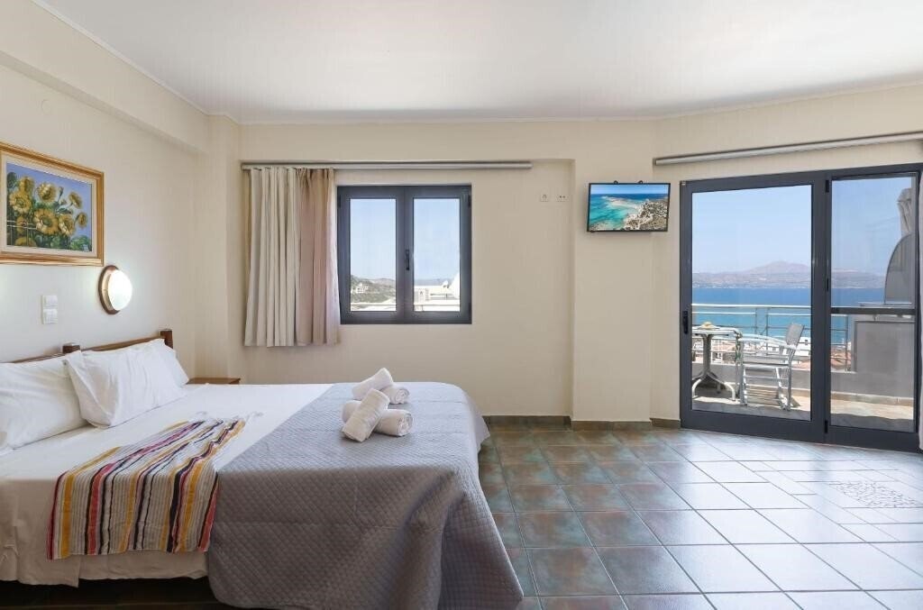 Фото Sunrise Suites & Apartments 4*