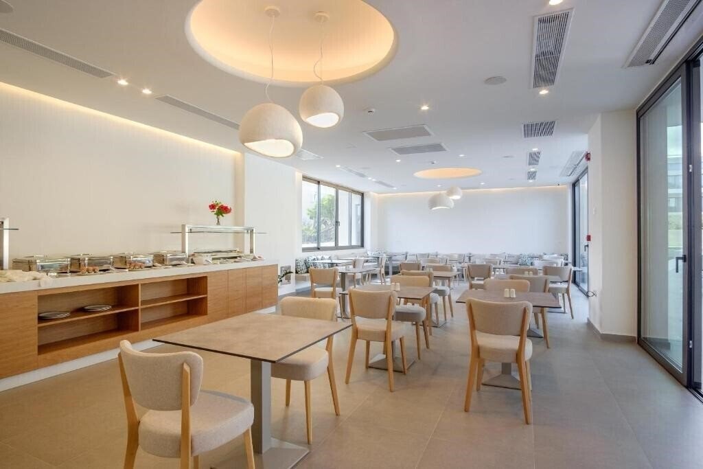 Фотография Phos Hotel Platanias Adults Only 4*