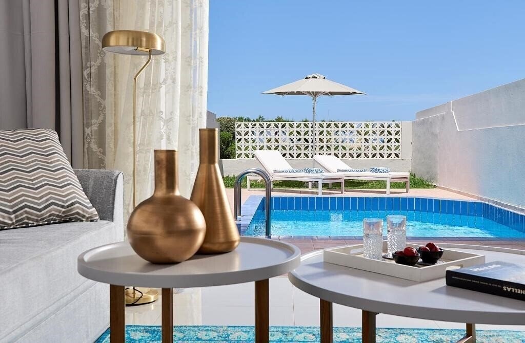 Фото Mythos Palace Resort & SPA 5*