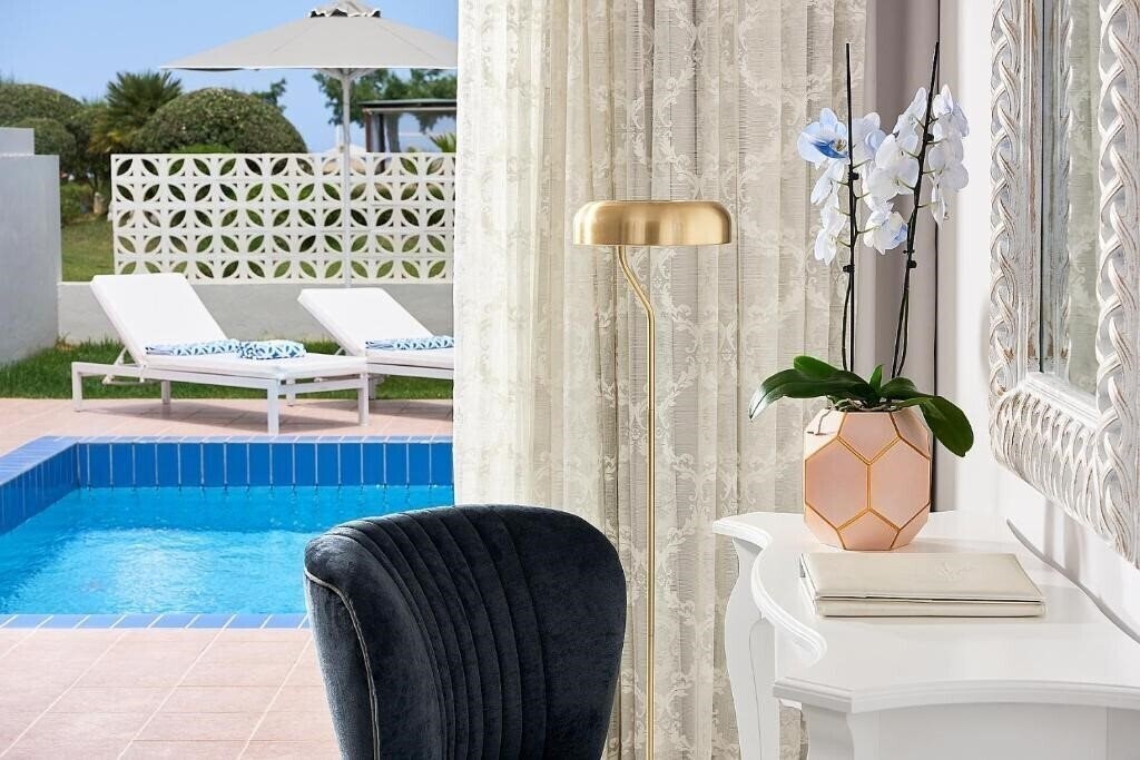 Фотографія Mythos Palace Resort & SPA 5*
