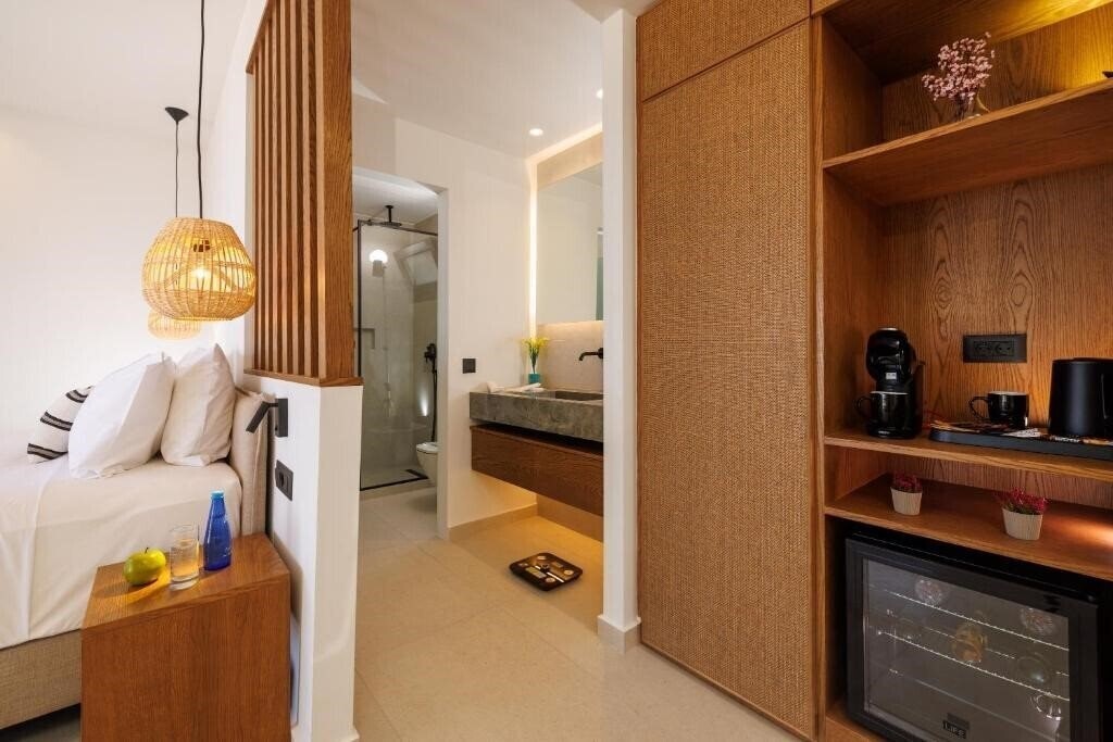 Фотографія Deos Luxury Suites 4*