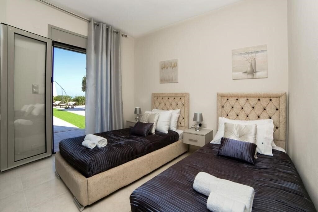 Фото Aroma Villas 4*