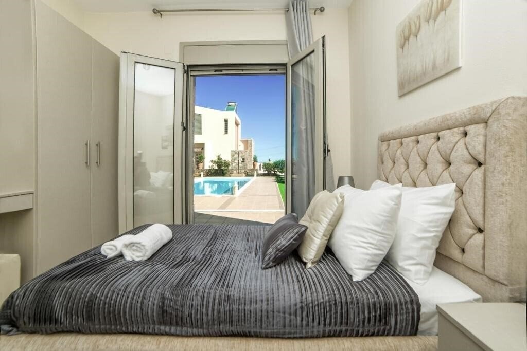 Картинка Aroma Villas 4*