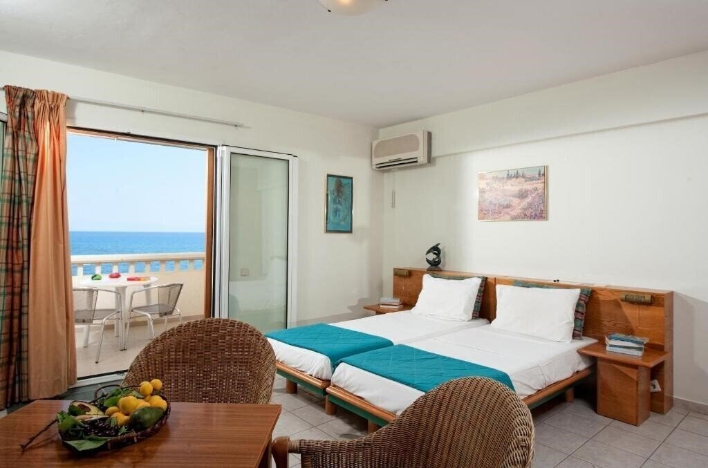 Отель Andromeda Apartments & Studios 3*