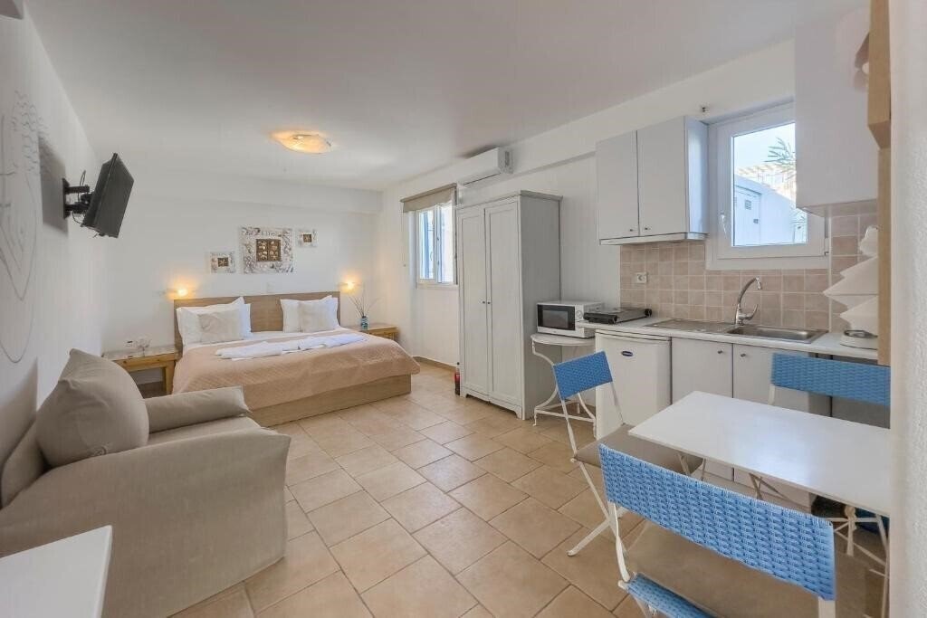 Фото Heliotropio Studios & Apartments 3*