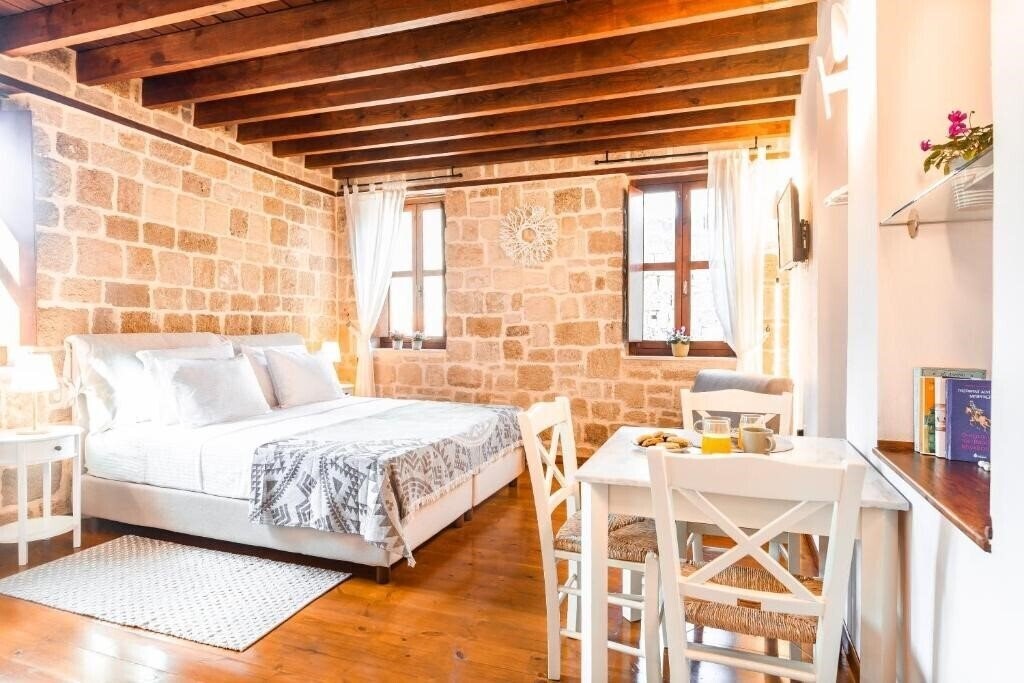Готель Mandorla Apartments 4*