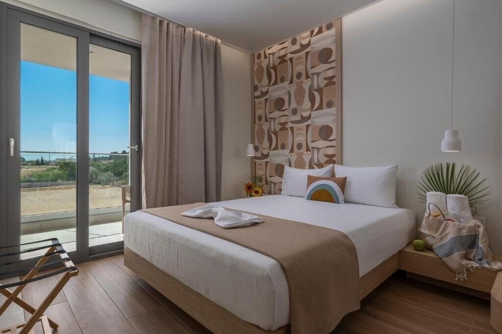 Фото Sandy Seaside Suites 4*