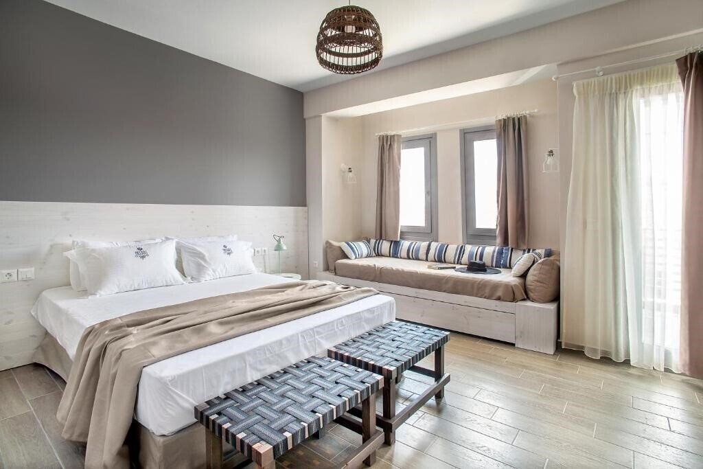 Фотографія Nissos Rooms Ammouliani 3*