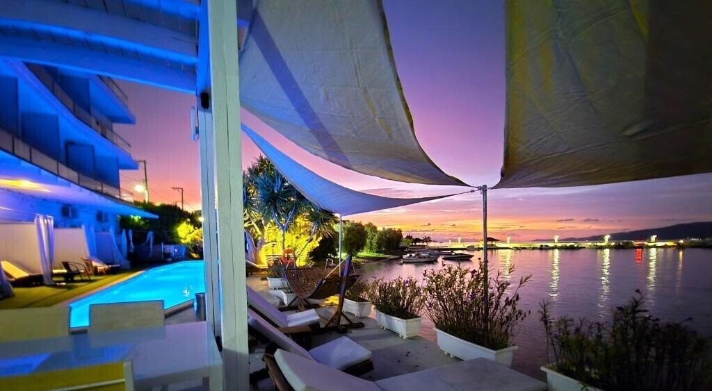 Отель Porto Evia Boutique Hotel 4*
