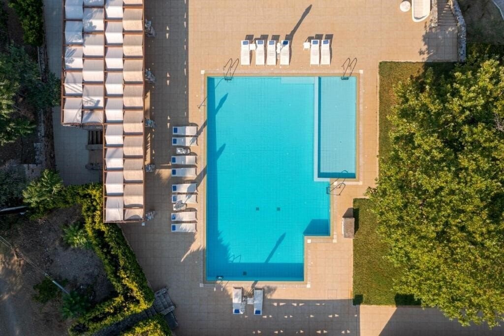 Отель Kaminos Resort Natural Senses 4*