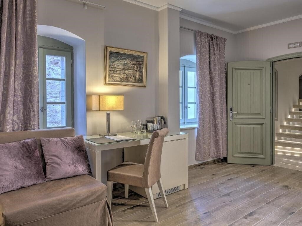 Фотографія Fiscardonna Luxury Suites 4*