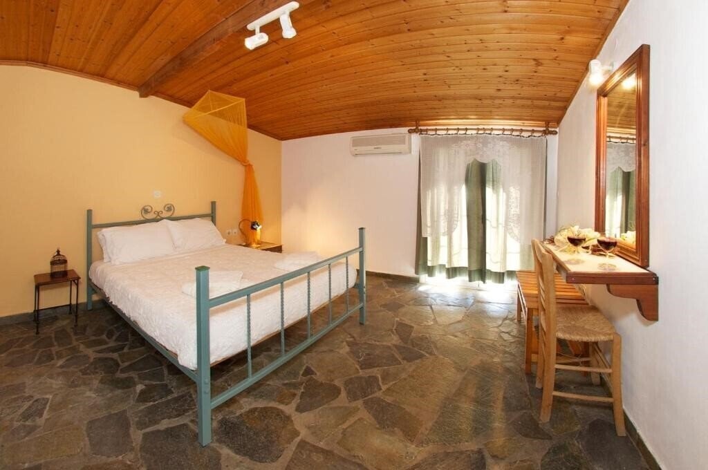 Фотографія Nostos Studios & Apartments 3*