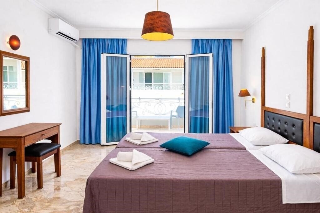 Фото Irene Apartments Agios Gordios 3*