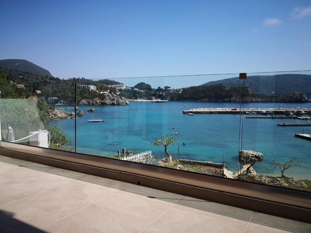 Готель Molos Beach Apartments 2*