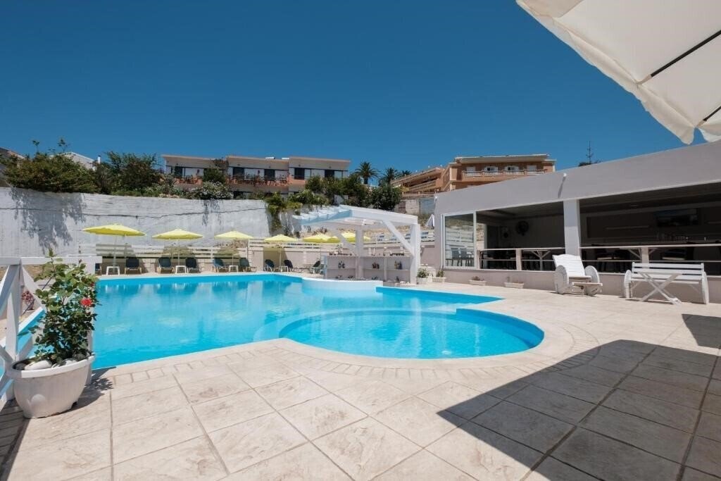 Фотографія Kouros Apartments & Studios 4*