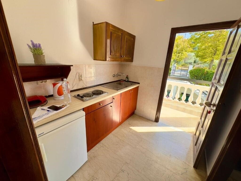 Фотография Tzilios Apartments Apt апартаменты