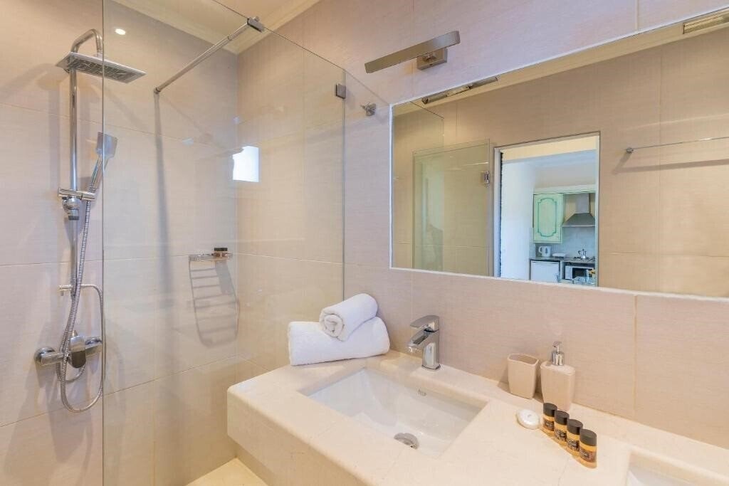 Фотографія Ziogas Luxury Apartments 4*