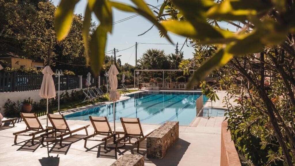 Фотографія Dominoes Aparthotel 3*
