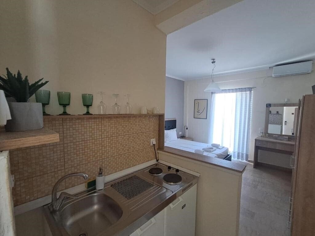 Фото Ionian Boutique Apartments 3*