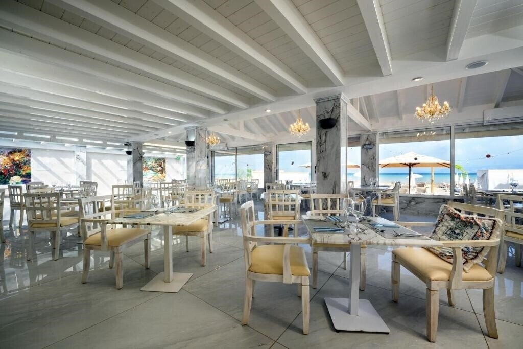 Фото Cavomarina Beach 4*